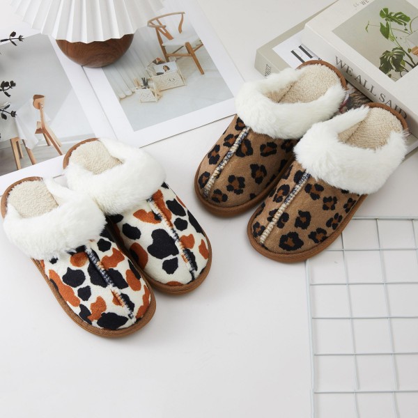 Faux Fur Collar Slippers with a plush, fluffy cuff, a soft faux suede upper, and a warm lined interior. The closed toe scuff style slips on and off with ease, while the cushioned sole adds comfort for long mornings at home, holiday visits, and quick trips to the mailbox. A luxe looking cozy essential that customers love to gift, these slippers deliver high perceived value and turn quickly from October through the holidays.