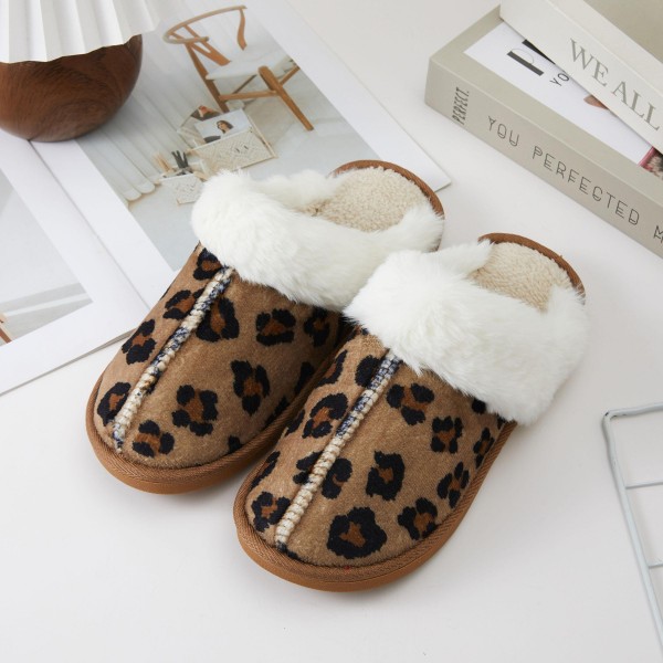 Faux Fur Collar Slippers with a plush, fluffy cuff, a soft faux suede upper, and a warm lined interior. The closed toe scuff style slips on and off with ease, while the cushioned sole adds comfort for long mornings at home, holiday visits, and quick trips to the mailbox. A luxe looking cozy essential that customers love to gift, these slippers deliver high perceived value and turn quickly from October through the holidays.