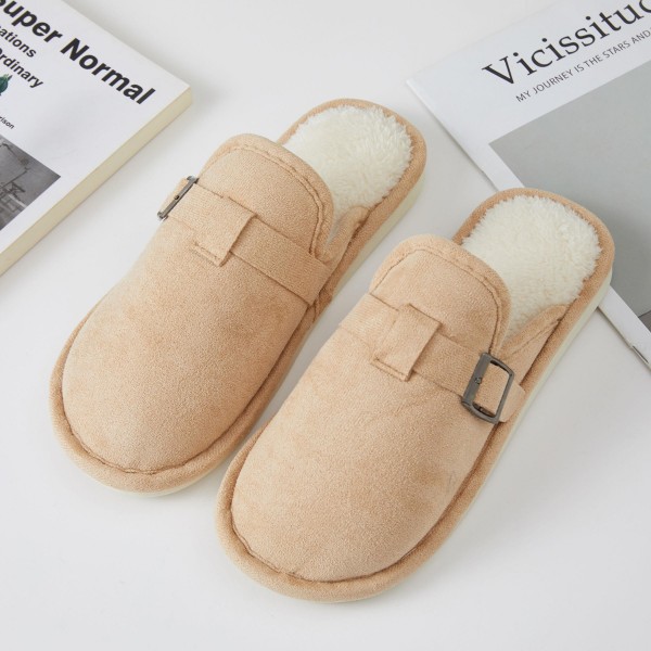Faux Suede Buckle Clog Slippers with a plush sherpa lining, a side buckle strap detail, and a sturdy cushioned sole. The clean, minimal clog shape looks put together enough for a quick coffee run yet feels cozy enough to wear around the house all day. Easy to slip on and off for busy mornings and relaxed weekends. Clog slippers are one of the season's most requested cozy styles, and this versatile design is an easy gift for anyone on the list.