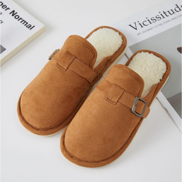 Faux Suede Buckle Clog Slippers with a plush sherpa lining, a side buckle strap detail, and a sturdy cushioned sole. The clean, minimal clog shape looks put together enough for a quick coffee run yet feels cozy enough to wear around the house all day. Easy to slip on and off for busy mornings and relaxed weekends. Clog slippers are one of the season's most requested cozy styles, and this versatile design is an easy gift for anyone on the list.
