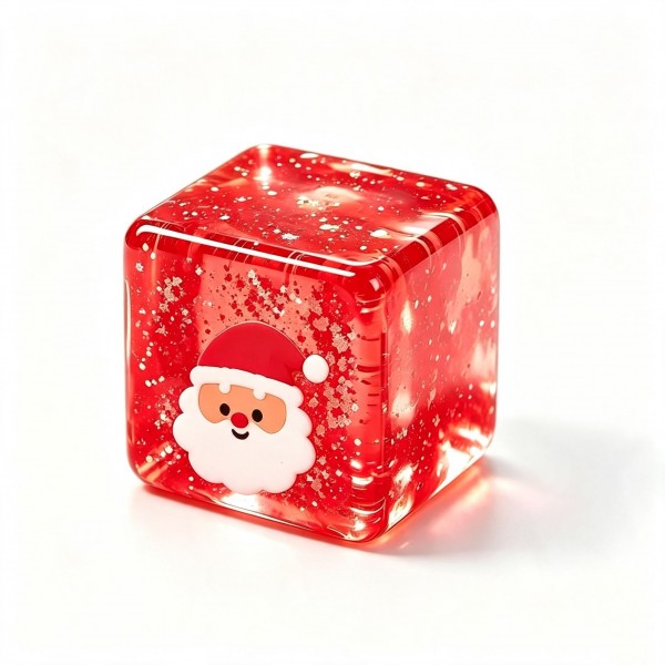 Christmas glitter cube squishy with a shimmering jelly body and a printed holiday character set inside the block. Light passes right through it, so it sparkles on a windowsill or under a tree. The soft cube squeezes flat and slowly rebounds, making it a fidget and a decoration at once. A festive impulse buy for holiday displays and gift bags.