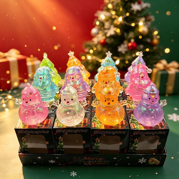Twelve-piece holiday squishy display in a printed counter box, mixing glitter-filled snowman and Christmas tree shapes. Each piece is individually boxed and ready to sell, so the unit merchandises straight out of the case with no extra setup. Assorted shapes and colors give a small counter footprint strong pull right through December. A proven stocking-stuffer program that sells through by the dozen.