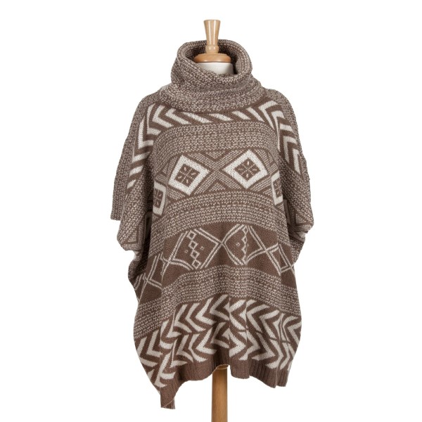 Heavyweight taupe and white Aztec printed, turtleneck poncho top with short sleeves. 100% acrylic. One size fits most. 