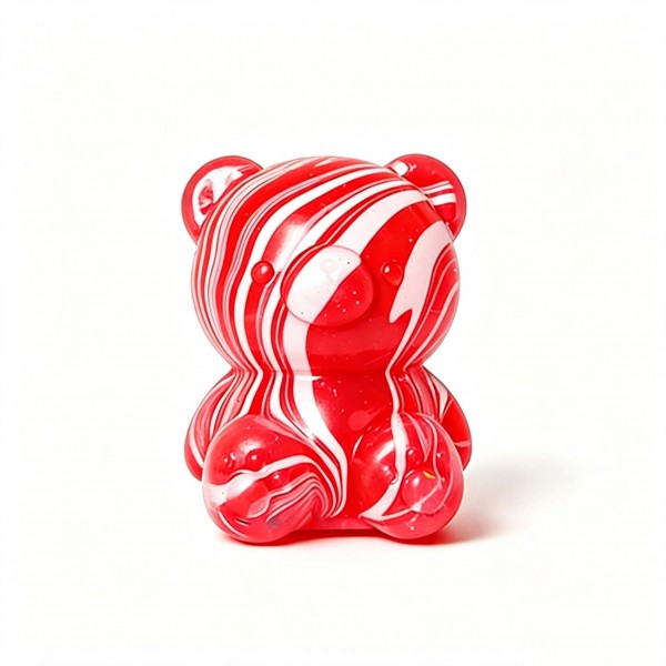 Oversized gummy bear squishy in a translucent marbled swirl finish, with a soft slow-rise body that squeezes flat and springs back. The candy-inspired shape and glossy swirl give a bowl display instant visual pull from across the store. A crossover fidget that sells to kids, teens, and adults alike, not just the toy shopper. Priced as an easy impulse add-on and an easy multiple at the register.