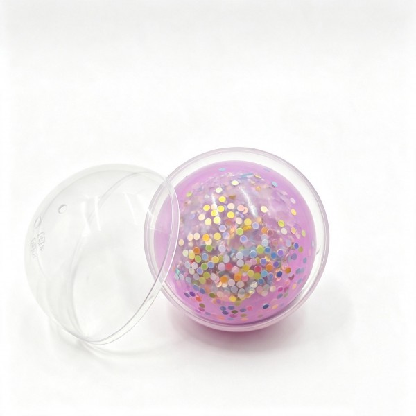 Bead filled squeeze ball packed inside a clear fillable ornament, so it works as a gift, an ornament, and a fidget all at once. The stretchy skin holds a soft bead core that shifts and crunches under your fingers. A satisfying stress reliever for desks, backpacks, and travel bags. Ornament packaging makes it a natural for holiday trees, gift toppers, and seasonal displays.