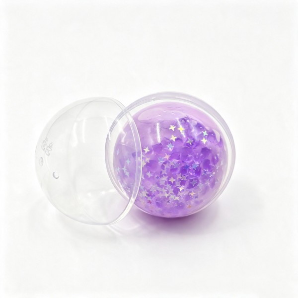 Bead filled squeeze ball packed inside a clear fillable ornament, so it works as a gift, an ornament, and a fidget all at once. The stretchy skin holds a soft bead core that shifts and crunches under your fingers. A satisfying stress reliever for desks, backpacks, and travel bags. Ornament packaging makes it a natural for holiday trees, gift toppers, and seasonal displays.