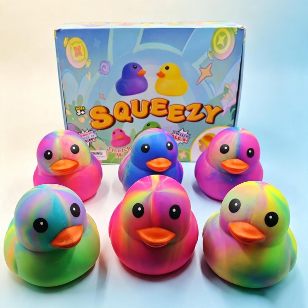 Tie-dye duck squishy in a soft slow-rise mold with the classic bath-duck silhouette and a bright molded bill. Squeezes flat and springs back for a simple stress-relief fidget that appeals well past the toy aisle. Ships in a random tie-dye color mix, so one order fills a display with variety. A steady impulse seller for register bowls, party favors, and gift baskets.