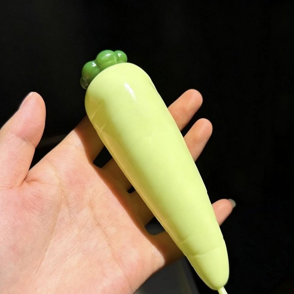 Carrot squishy molded with ridged root detail and a leafy top, stretched long so it fills the hand. The soft body squeezes down the length and rebounds slowly for a satisfying reset. A garden themed desk toy that works for spring displays, Easter baskets, and everyday gifting. Long form squishies like this stand out in a bin and invite a second look.