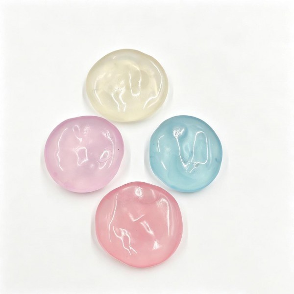 Jelly blob squishy in a soft translucent gel that flattens into a puddle and slowly pulls itself back into a dome. Stretchy skin takes a poke, a pinch, or a full press without splitting, which makes it a favorite for anxious hands. A counter impulse toy for boutiques stocking classroom rewards, sensory bins, desk toys, and stocking stuffers. Water blob squishies are the piece customers cannot put down once they touch it.