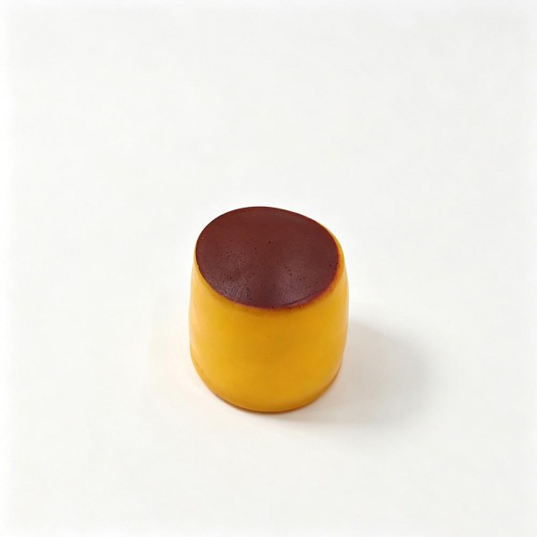 Pudding cup squishy molded as a molded custard with a glossy caramel top. Slow rise foam compresses under a squeeze and slowly returns to shape for repeat fidgeting. A counter impulse toy for boutiques stocking birthday favors, classroom rewards, sensory bins, and stocking stuffers. Dessert squishies photograph well on a display riser and reorder as fast as they ring up.