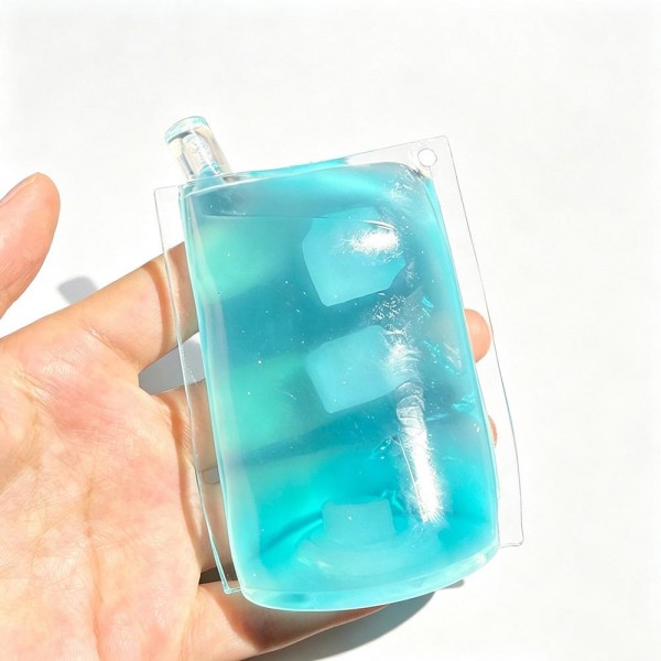 Ice pop squishy sealed in a clear sleeve, molded with a frosted jelly look and suspended cube detail that shifts as you squeeze. The soft gel body flattens under pressure and rebounds slowly for a satisfying reset. A cooling, summery novelty for freezer pop displays, pool shop merchandising, and party favors. Bright packaging makes it an easy grab for kids and gift buyers.