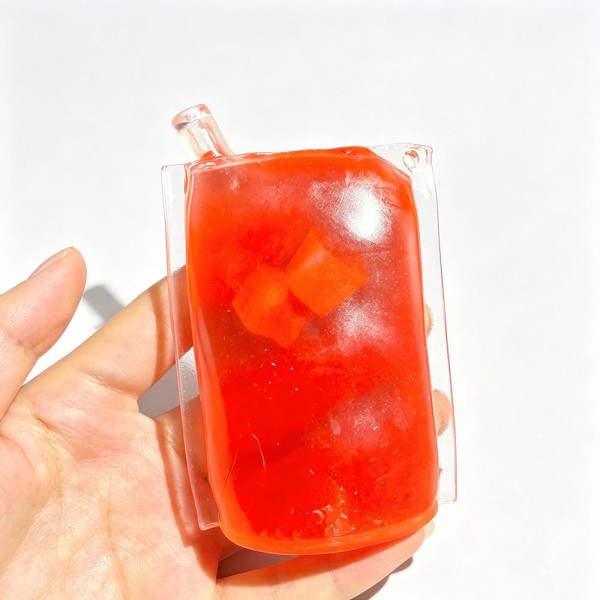 Ice pop squishy sealed in a clear sleeve, molded with a frosted jelly look and suspended cube detail that shifts as you squeeze. The soft gel body flattens under pressure and rebounds slowly for a satisfying reset. A cooling, summery novelty for freezer pop displays, pool shop merchandising, and party favors. Bright packaging makes it an easy grab for kids and gift buyers.