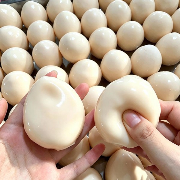 Egg squishy molded to lifelike scale with a smooth shell finish and a gentle slow rise squeeze. The simple, clean shape makes it a quiet fidget for a desk or a kitchen shelf and a favorite for food themed collections. Fun for breakfast displays, farm themed merchandising, and everyday gifting. Small, low ticket, and easy to stack on a counter for add on sales.