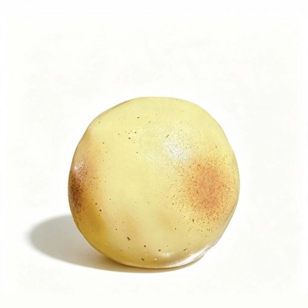 Potato squishy in a soft translucent gel, freckled and dimpled so it reads like a real spud. The stretchy skin flattens into a puddle under a press and slowly pulls itself back into a dome. A counter impulse toy for boutiques stocking gag gifts, classroom rewards, sensory bins, and stocking stuffers. Novelty food squishies are the piece customers cannot put down once they touch it.