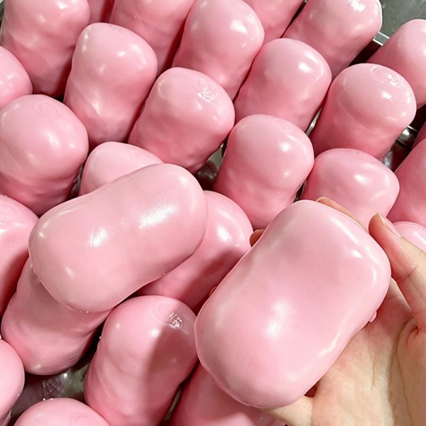 Oversized marshmallow squishy with a soft pillowy shape and a matte candy finish that dents and rebounds slowly under your thumb. Big enough to feel substantial in the hand and light enough to toss in a bag. A comforting stress reliever for desks, dorm rooms, and car consoles. Sweet shop styling makes it an easy grab and go gift for kids and adults alike.