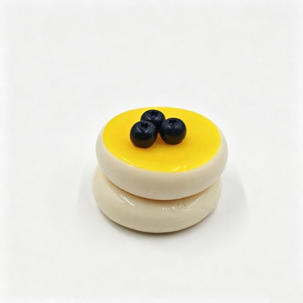 Mini cake squishy sculpted like a bakery case dessert, with piped frosting, a glossy drip, and tiny fruit and cream details on top. The slow rise foam holds its shape after every squeeze, so it stays photo ready on a shelf or a register display. A charming pick for dessert lovers, teachers, and anyone building a cute desk collection. Realistic food squishies like these are proven impulse sellers.