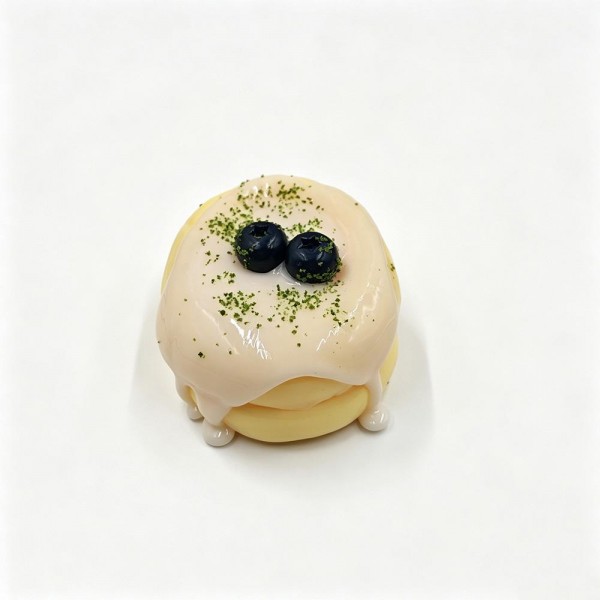 Mini cake squishy sculpted like a bakery case dessert, with piped frosting, a glossy drip, and tiny fruit and cream details on top. The slow rise foam holds its shape after every squeeze, so it stays photo ready on a shelf or a register display. A charming pick for dessert lovers, teachers, and anyone building a cute desk collection. Realistic food squishies like these are proven impulse sellers.