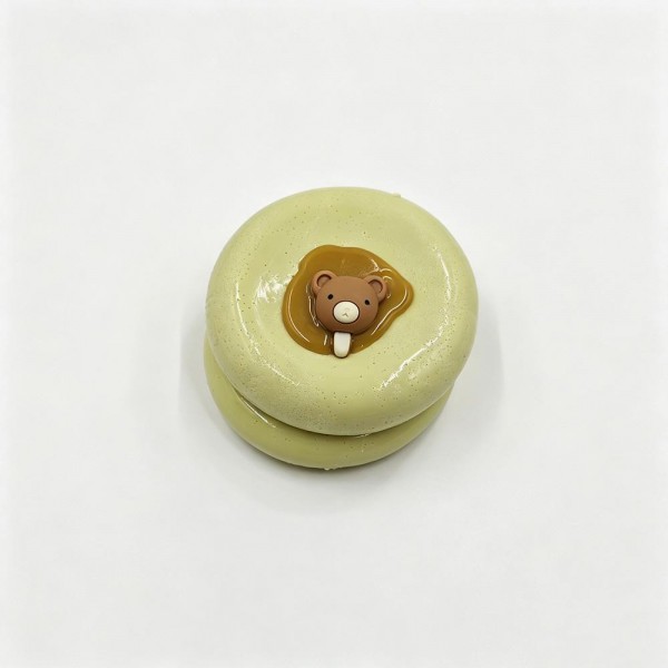 Mini cake squishy sculpted like a bakery case dessert, with piped frosting, a glossy drip, and tiny fruit and cream details on top. The slow rise foam holds its shape after every squeeze, so it stays photo ready on a shelf or a register display. A charming pick for dessert lovers, teachers, and anyone building a cute desk collection. Realistic food squishies like these are proven impulse sellers.