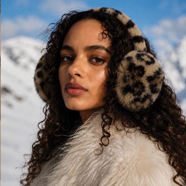 Animal print faux fur earmuffs built on a soft padded band that sits comfortably over the ears. Dense plush pile blocks wind on cold mornings while staying light enough for everyday wear. The print gives a basic winter accessory real personality on the shelf. An easy impulse item to merchandise beside beanies, gloves, and scarves.