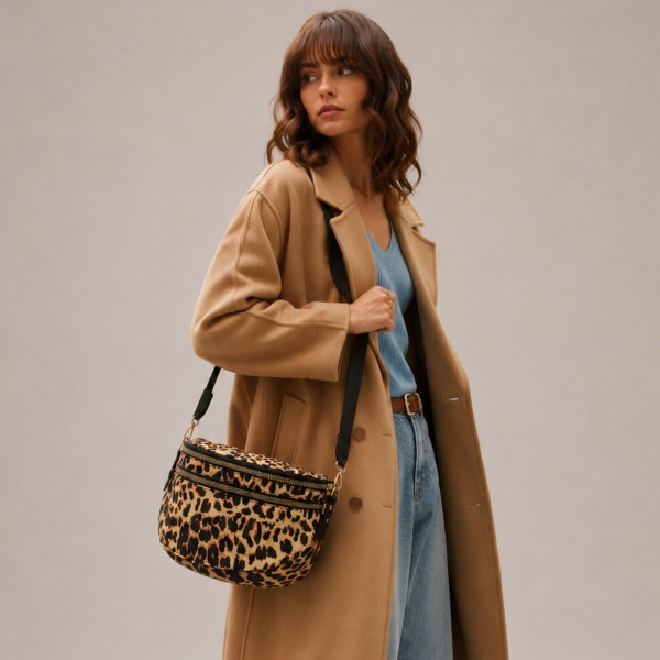 Do Everything In Love Nylon Leopard Print Cross Body Bag

- Full Zip Closure
- 2 Front External Zip Pockets
- 1 Back External Zip Pocket
- Lined Body
- 1 Internal Zip Pocket
- Removable Cross Body Strap
- 100% Polyester
- Approximately 12" L X 9" T X 4" D

