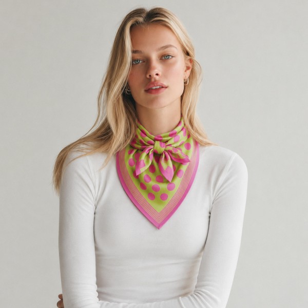 Neckerchief style bandana scarf with a dotted border and a bright contrast trim. The compact square ties close at the throat for the small scarf look that keeps trending, and it works just as well knotted on a bag strap. Lightweight woven fabric means it packs flat and never feels heavy. Priced so shoppers grab more than one.