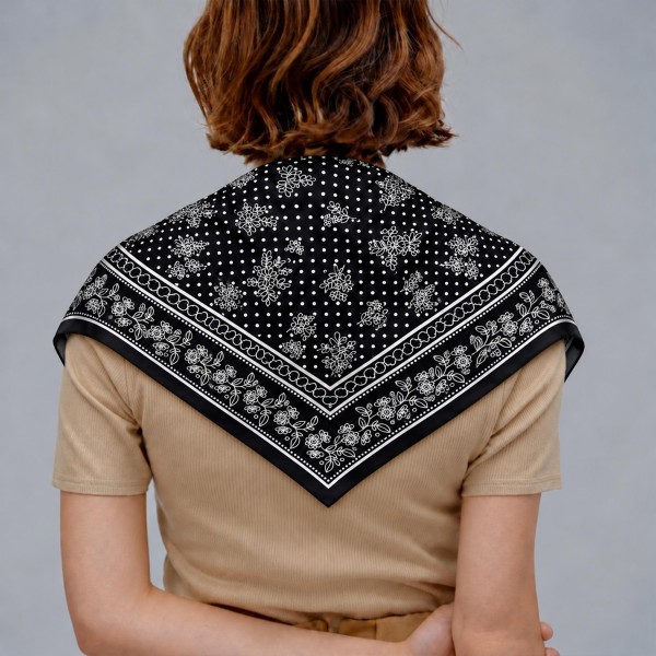 Bandana Print Square Scarf in silky 100% polyester, sized at a generous 35.4 inches square. A classic bandana layout with tiny dots, floral vines, and a decorative border gives it a relaxed, easygoing feel. Wear it knotted at the neck, tied around the waist, draped over the shoulders, or styled in the hair. An easy layering piece for fall outfits that customers can wear a dozen different ways.