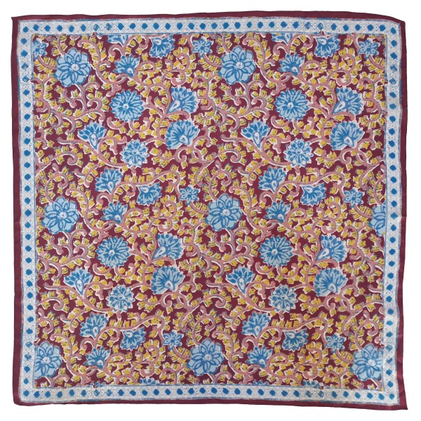 Floral Print Square Scarf in silky 100% polyester, measuring 27.5 inches square. Block print inspired blooms and trailing leaves fill the center, finished with a dotted floral border. Tie it at the neck, wear it as a hair scarf, or knot it around a bag strap for an instant update. A pretty, easy to style piece that works with sweaters, blazers, and tees, and makes a simple gift at an easy price.