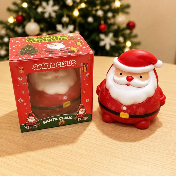 Santa Claus Squishy Toy in Gift Box

Santa Claus Squishy Toy with a jolly sculpted face, curly beard, belt buckle, and snowflake details molded into his round belly. The smooth, glossy skin feels soft and rubbery, and a firm squeeze sinks into his chubby body before he springs right back into shape. Each Santa comes in a windowed Santa Claus gift box, ready to wrap or drop into a stocking. A cheerful holiday impulse buy that looks great lined up on a counter or tree side display.

- Packaged in a windowed gift box