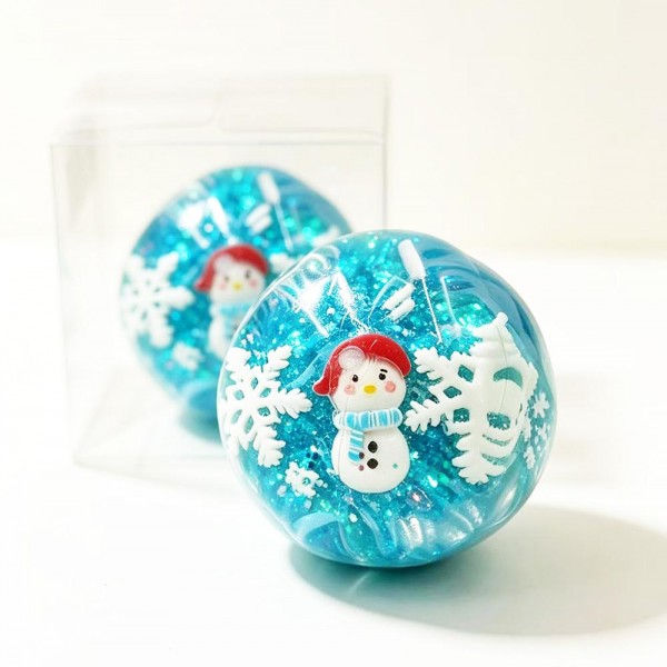 Christmas Charm Squishy Stress Ball

Christmas Charm Squishy Stress Ball with a clear, stretchy shell packed with holiday surprises inside. Each style has its own festive fill, from sparkly glitter beads and candy sprinkles to a snow globe style flurry or a smooth, dough like center, all mixed with peppermints, snowflakes, and charms like Santa, gingerbread men, a snowman, and reindeer. Squeeze it to feel the filling shift and press against your palm, then watch it pop back round. A colorful stocking stuffer that looks great piled in a bowl by the register.

- Every style has a different holiday fill