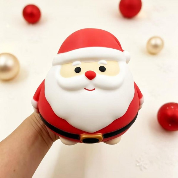 Christmas Character Squishy Toy in Gift Box

Christmas Character Squishy Toy available as Santa Claus, a snowman in a knit hat and scarf, or a reindeer with a shiny nose, each with a big, rounded body and a cheerful sculpted face. The smooth, glossy skin has a soft, rubbery feel, and the plump body squishes deep under your palm before bouncing right back into shape. Every piece comes in a clear holiday print gift box, so it is ready to wrap, gift, or display. A cheerful holiday squishy that makes a great centerpiece for any Christmas toy table.

- Packaged in a clear holiday print gift box