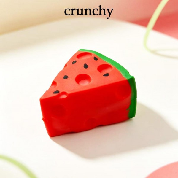 Crunchy Watermelon Squishy Toy

Crunchy Watermelon Squishy Toy shaped like a juicy wedge with a sculpted rind and seed details. The soft, smooth surface gives way to a crunchy inside, so every squeeze delivers a satisfying crackle like biting into fresh fruit. Food squishies are always a hit, and this realistic slice adds a fun pop of summer to any squishy display all year long. An easy impulse buy for kids, teens, and ASMR fans.