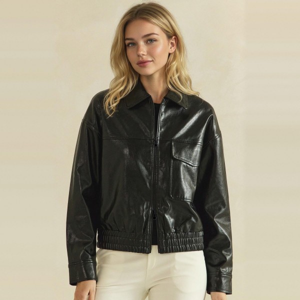 Faux Leather Bomber Jacket with a classic point collar, full zip front, flap chest pockets, and a smocked elastic waistband for a flattering cinched fit. The soft vegan leather has a rich, buttery finish that layers easily over turtlenecks, tees, and sweaters. A versatile outerwear piece for crisp fall days, game nights, and weekend errands. Boutique shoppers love an affordable leather look, and this bomber silhouette sells season after season.