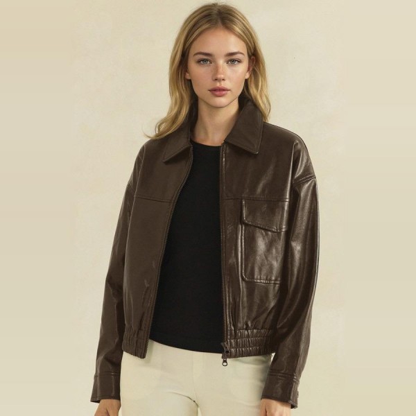 Faux Leather Bomber Jacket with a classic point collar, full zip front, flap chest pockets, and a smocked elastic waistband for a flattering cinched fit. The soft vegan leather has a rich, buttery finish that layers easily over turtlenecks, tees, and sweaters. A versatile outerwear piece for crisp fall days, game nights, and weekend errands. Boutique shoppers love an affordable leather look, and this bomber silhouette sells season after season.