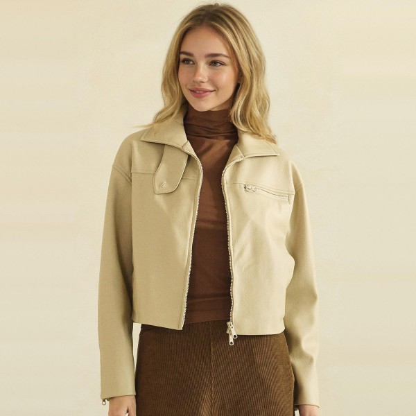 Cropped Faux Leather Jacket with a full zip front, wide point collar, and zippered chest pocket. The soft vegan leather has a smooth, supple finish and a boxy cropped fit that pairs perfectly with high waisted jeans, dresses, and wide leg pants. An easy layering piece for cool fall evenings, concerts, and weekend outings. Faux leather jackets are a top seasonal request, and this cropped cut gives customers a modern take that moves fast.