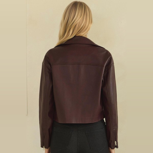 Cropped Faux Leather Jacket with a full zip front, wide point collar, and zippered chest pocket. The soft vegan leather has a smooth, supple finish and a boxy cropped fit that pairs perfectly with high waisted jeans, dresses, and wide leg pants. An easy layering piece for cool fall evenings, concerts, and weekend outings. Faux leather jackets are a top seasonal request, and this cropped cut gives customers a modern take that moves fast.