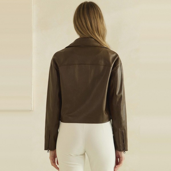 Cropped Faux Leather Jacket with a full zip front, wide point collar, and zippered chest pocket. The soft vegan leather has a smooth, supple finish and a boxy cropped fit that pairs perfectly with high waisted jeans, dresses, and wide leg pants. An easy layering piece for cool fall evenings, concerts, and weekend outings. Faux leather jackets are a top seasonal request, and this cropped cut gives customers a modern take that moves fast.