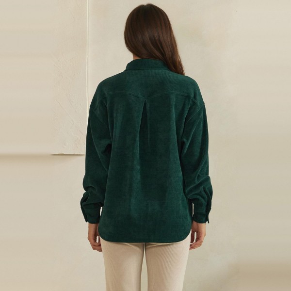 Corduroy Pullover Shirt with a classic point collar, half button placket, and flap chest pocket. The soft wale corduroy has a relaxed oversized fit with dropped shoulders and buttoned cuffs for an effortless, lived in look. Customers can wear it on its own with jeans or leggings, or layer it over a turtleneck for crisp fall days. A cozy statement top with a vintage inspired feel, this style is a natural fit for autumn displays and sells quickly.