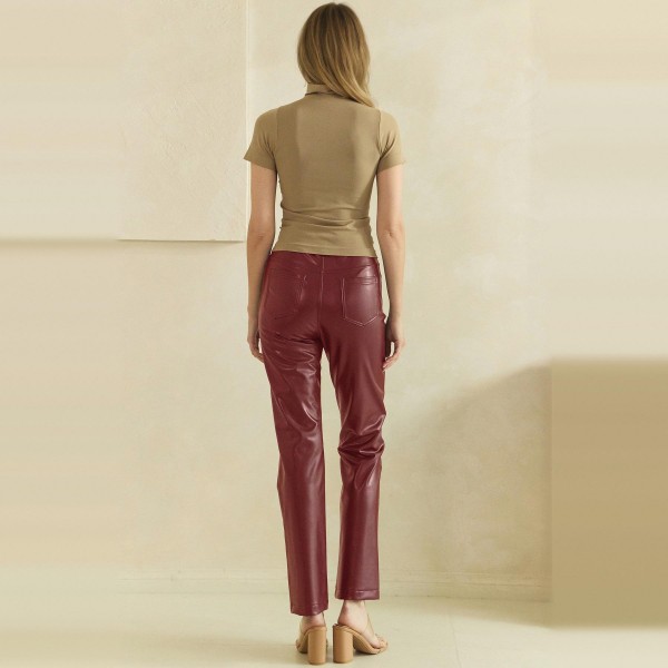 Faux Leather Five Pocket Pants with a classic jean inspired cut, button and zip closure, and a slim straight leg that hits right at the ankle. The soft vegan leather has a subtle sheen and smooth finish that looks polished without feeling stiff. Easy to style with sweaters, blazers, and booties for work, holiday parties, or a night out. Faux leather remains one of the strongest fall and winter categories, and this familiar fit makes it an easy sell for every customer.