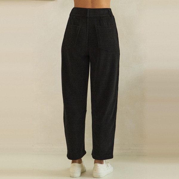 Ribbed Straight Leg Pants in a soft corduroy style knit with a smooth elastic waistband and functional front patch pockets. The relaxed straight leg hits at the ankle for a polished yet comfortable fit that works from the office to weekend errands. Pair them with cardigans, tucked tees, or chunky sweaters for easy fall and winter outfits your customers will wear on repeat. A comfortable pull on style at a friendly price point, these textured pants sell through fast all season.