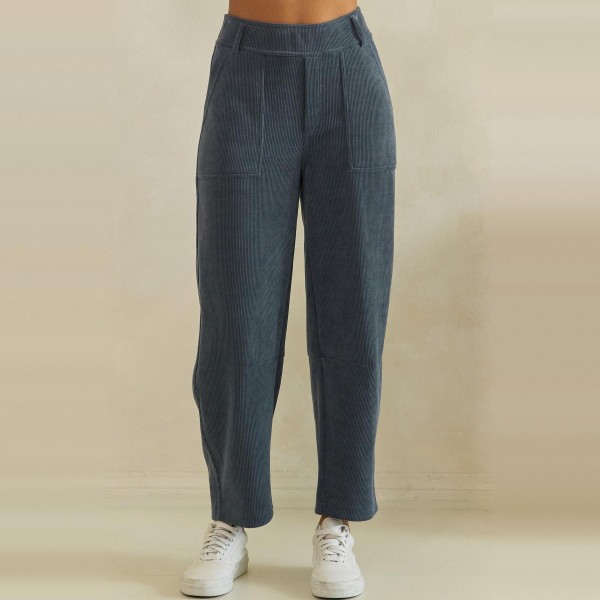 Ribbed Straight Leg Pants in a soft corduroy style knit with a smooth elastic waistband and functional front patch pockets. The relaxed straight leg hits at the ankle for a polished yet comfortable fit that works from the office to weekend errands. Pair them with cardigans, tucked tees, or chunky sweaters for easy fall and winter outfits your customers will wear on repeat. A comfortable pull on style at a friendly price point, these textured pants sell through fast all season.