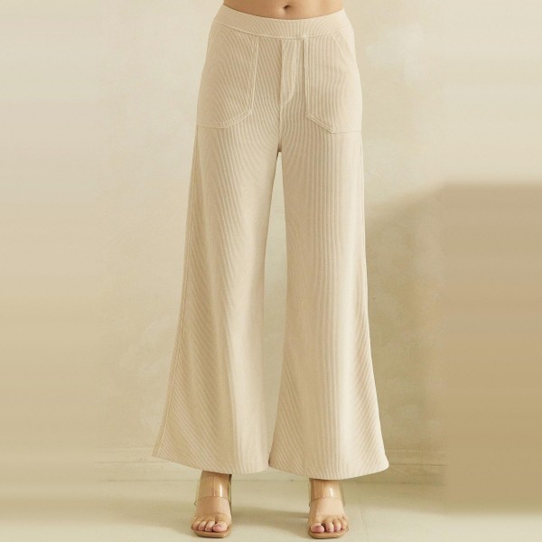 Ribbed Wide Leg Pants with a soft corded knit texture, comfortable elastic waistband, and roomy front patch pockets. The relaxed high rise fit falls into a full length wide leg that drapes beautifully and flatters every shape. Customers can dress them up with a fitted knit and boots or keep it cozy with a sweatshirt and sneakers for fall weekends, travel days, and casual Fridays. Easy to fit and endlessly versatile, these comfy fall pants are a reliable repeat seller for any boutique.