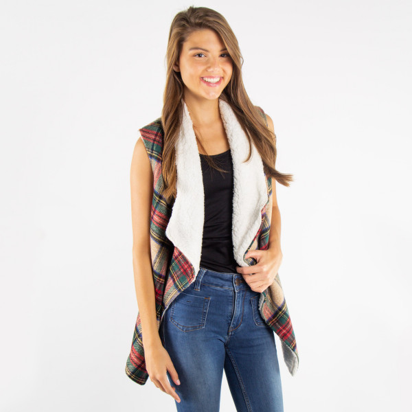 Tartan Plaid Sherpa Vest with Pockets.

- Pockets
- One size fits most 0-14
- Approximately 24" Long 
- 100% Polyester