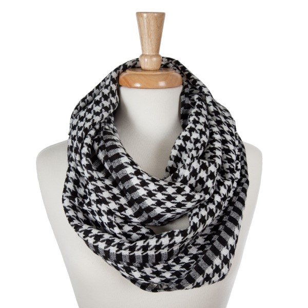 Lightweight knitted houndstooth infinity scarf.					