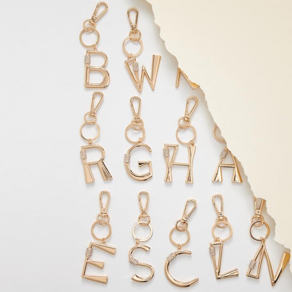 Gold Initial Keychain Featuring Cubic Zirconia Accents. 

- Keyring to hold your Keys
- Clip to clip onto your Bag/Purse or Backpack
- Approximately 3" in Length