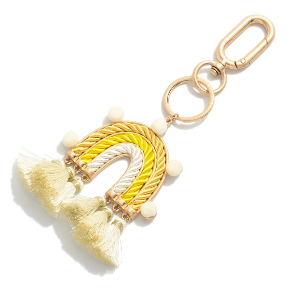 Rope Rainbow Keychain Featuring Tassels and Pom-Pom Accents.

- Approximately 5.5" L