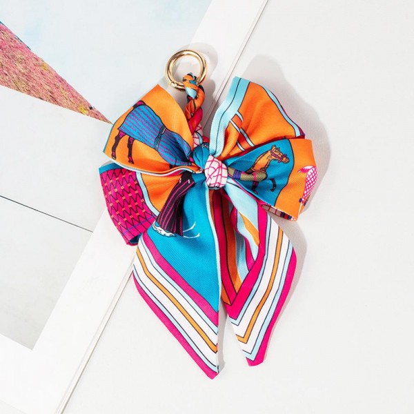 Status Print Bow Key Ring 

- Approximately 6" L