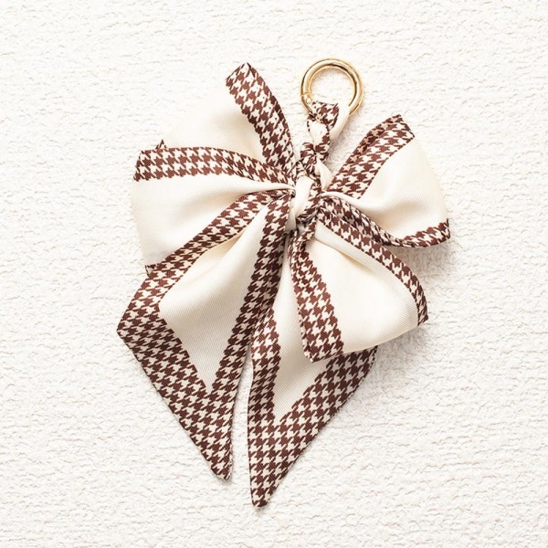 Houndstooth Edge Print Bow Key Ring 

- Approximately 6" L