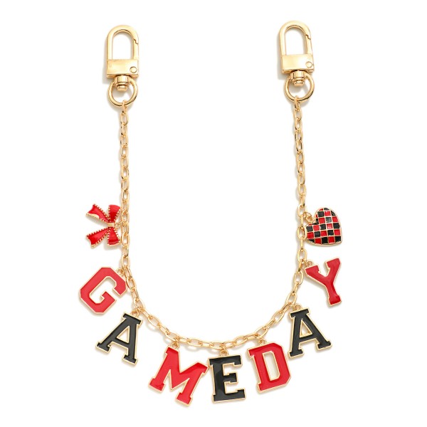 Gold Tone "Game Day" Chain Link Bag Charm Featuring Bow And Heart Charm 

- Approximately 14" L 