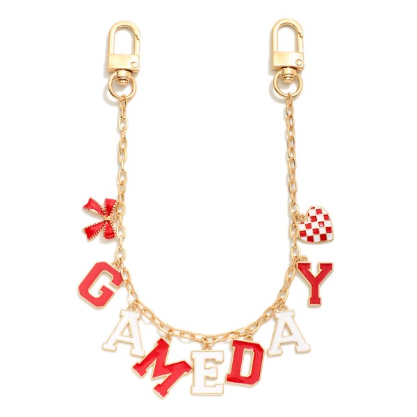 Gold Tone "Game Day" Chain Link Bag Charm Featuring Bow And Heart Charm 

- Approximately 14" L 