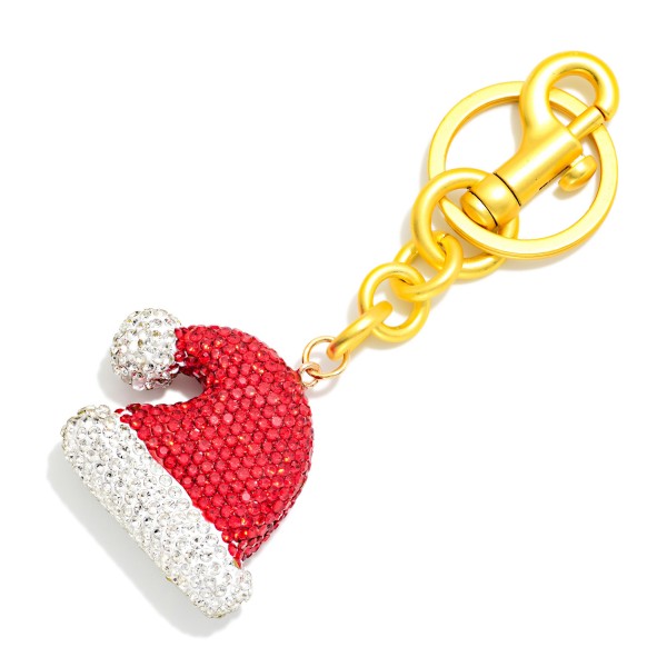 Rhinestone Santa Hat Keychain with a fully crystal covered hat and plush trim look, finished with a swivel clasp and key ring. It clips onto keys, purses, backpacks, and bag straps for festive sparkle from Thanksgiving through New Year's. A fun stocking stuffer and an easy gift exchange pick. Bright holiday bling at an impulse friendly price makes it a natural counter add on that keeps moving all season.